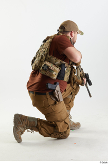 Luis Donovan Contractor Pose 3 aiming gun kneeling whole body…